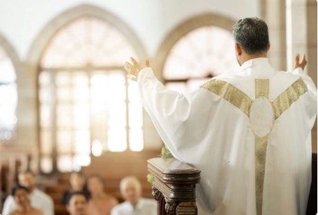 Priest celebrating the Divine Liturgy at the altar